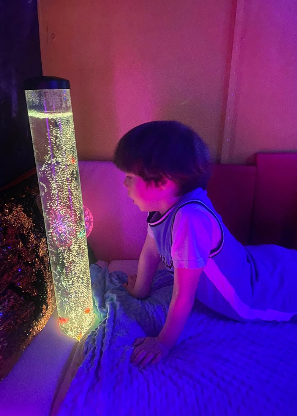 girl wearing white sleeveless dress beside balloons